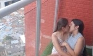 passionate kisses and touching my girlfriend's pussy on the balcony