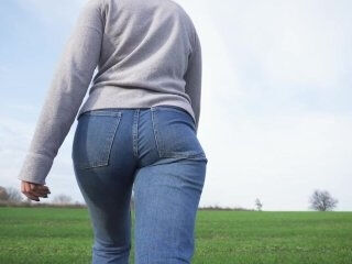 Milf With Phat Ass Walking Outdoors In Loose Jeans