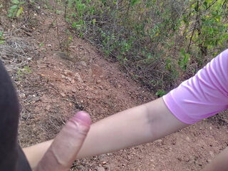 Latina teen gives a blowjob in the woods