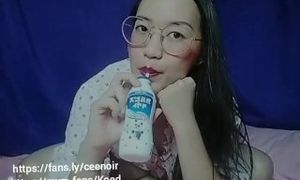 Cute Asian girl drink milk and masturbate