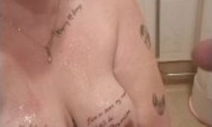 Owned Slut wife holds the phone wile I piss on her peirced tits