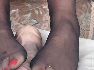 Mrs Mature Feet showing all her feet lovers her soles and toes in sheer Black Hold Ups. Part 1