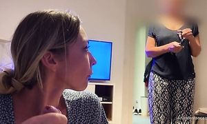 Daughter gives a blowjob while her mom watches