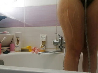 Sexy wife takes shower, big ass, big tits.