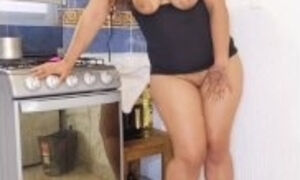 young housewife masturbating in the kitchen