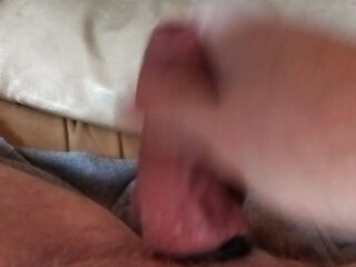 my friend is lying on the couch and jerking off his cock on my couch he might want to take me in my wet ass hole tonight