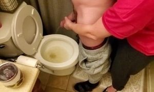 'Helping my neighbor by holding his dick while he pees in the toilet while my boyfriend's at work'
