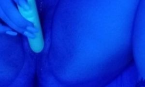 Blue light pussy play with dildo, very wet.