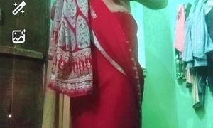 Indian gay Crossdresser xxx nude in red saree showing his bra and boobs