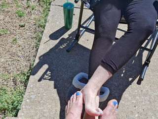 Showing off our pedicure toes while playing footsie in public